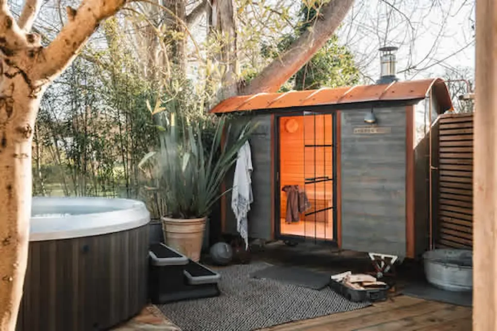 garden sauna hut with cold plunge tub