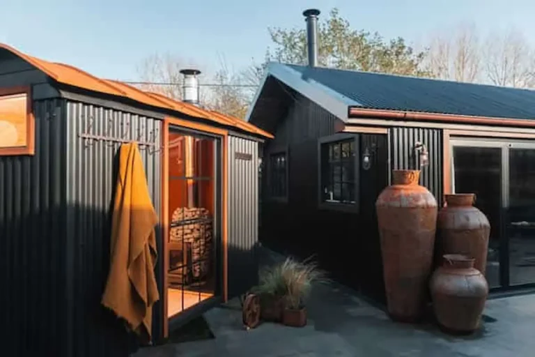 garden sauna hut with hot tub area