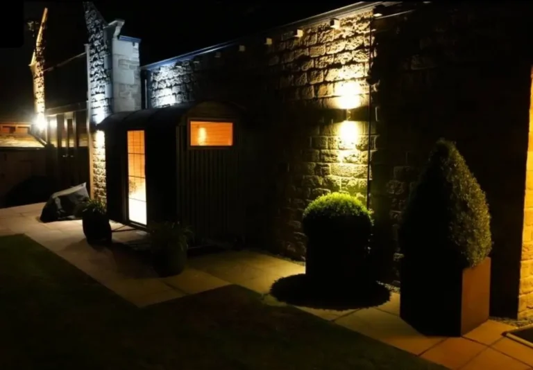 luxury outdoor sauna hut at night