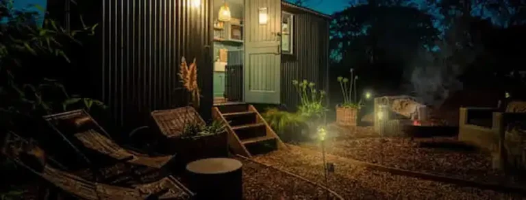 luxury shepherds hut for sale croft exterior evening firepit