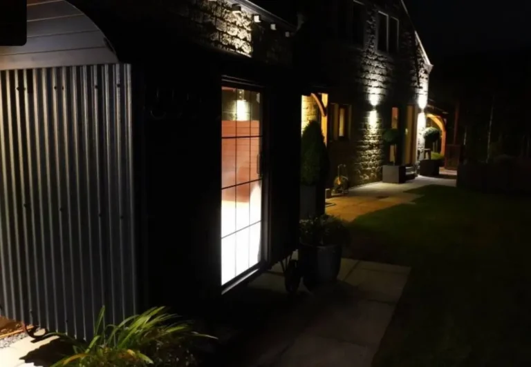 outdoor sauna hut glowing window night